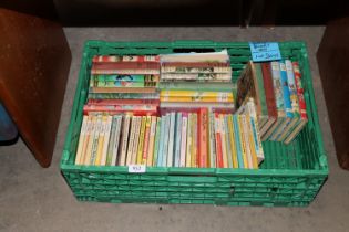 A box of various Enid Blyton books etc