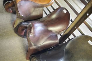 A leather horse riding saddle