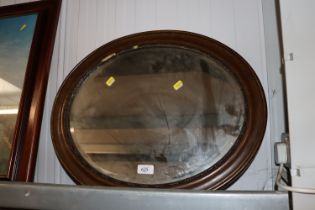 A Noble framed bevel edged mirror