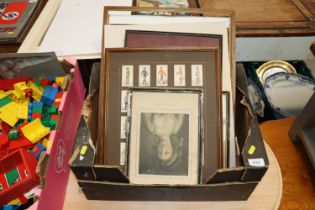 A box of various pictures and prints and framed ci