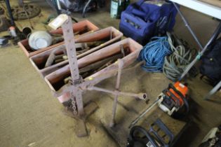 A cart jack and a wheel brace