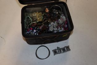 A box of various costume jewellery