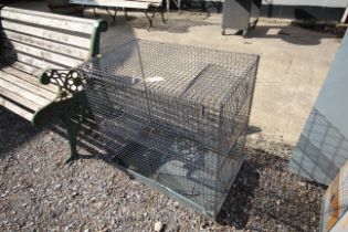 A metal two tier pet cage