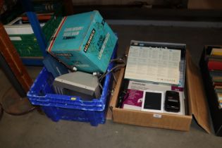 A box of assorted camera equipment, an Acer Pocket