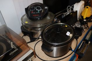 A slow cooker and a Legend steamer