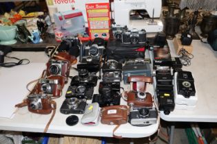 A collection of various vintage cameras including