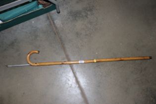 A horse measuring walking stick