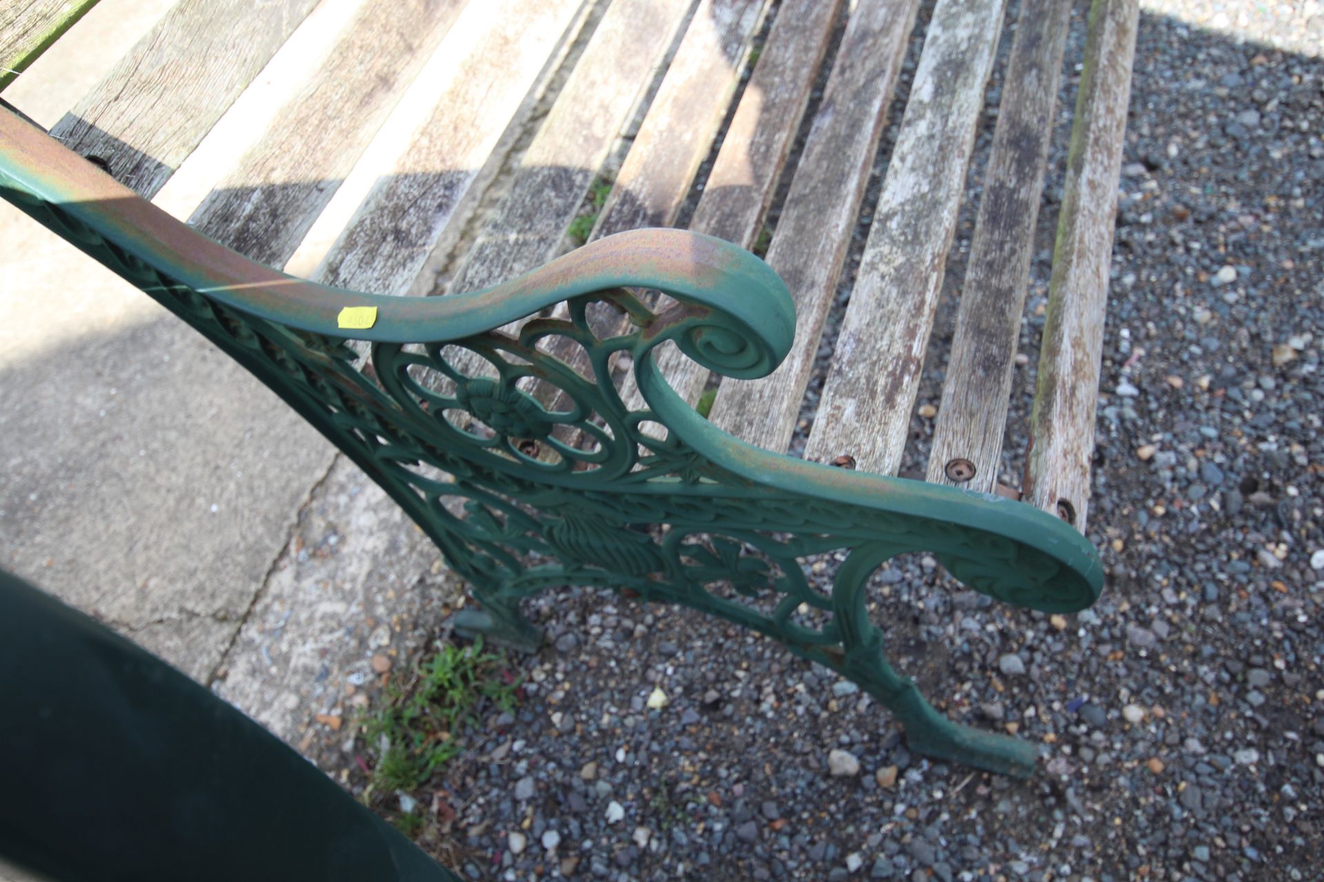 A two seater wooden slatted garden bench with gree - Image 3 of 3