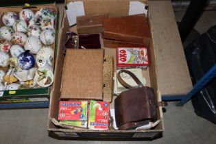 A box containing advertising tin, Lurpak butter di