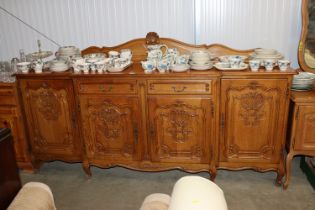 A large French style oak sideboard