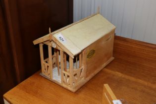 A scale model of a 1930s style beach hut