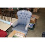 A button back upholstered nursing chair