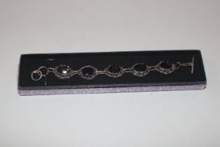 A 925 silver and amethyst set bracelet