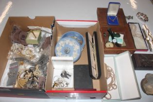 Two boxes containing various trinket boxes, costum