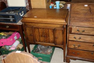 A 1930's oak gramophone cabinet