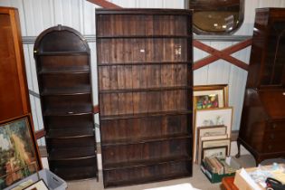A stained pine open fronted bookcase