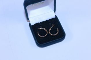 A pair of 9ct gold ear-rings, approx. 2gms total w
