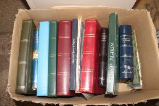 A box containing mixed world stock books and stamp