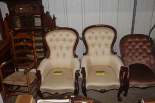 A pair of Victorian spoon back chairs