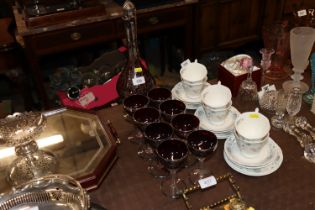 A silver overlaid decanter and matching glasses