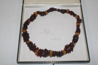 An amber coloured necklace