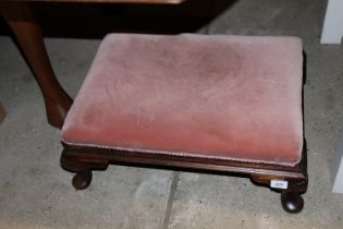 A 19th Century Dralon upholstered stool, raised on