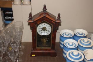 A late Victorian American two hole mantel clock