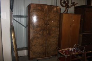 An Art Deco burr walnut wardrobe