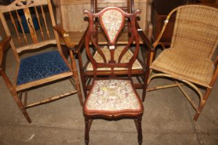 An Art Nouveau style mahogany and upholstered bedr
