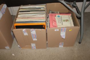 Two boxes containing various records and CD's