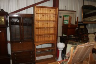 A pine open fronted bookcase