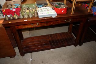 A Bassett hall table fitted two drawers