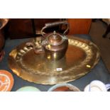 An Eastern brass tray together with a copper kettl