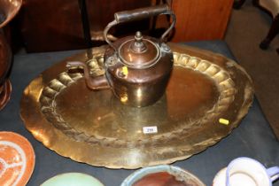 An Eastern brass tray together with a copper kettl
