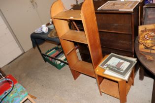 An oak open fronted bookcase with an oak two tier