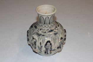 An oriental crackle glaze vase with applied figura
