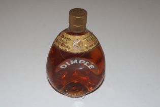 A Dimple bottle of John Haig scotch whisky