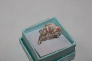 A Sterling silver and moonstone set ring, ring siz