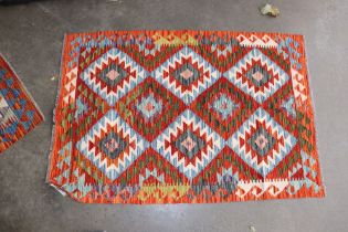 An approx. 4'2" x 2'8" Chobi Kelim rug