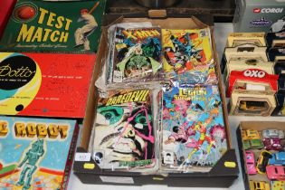 A box of Marvel and DC comics