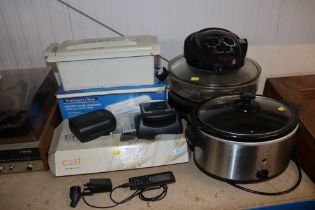 A slow cooker, a steam cooker, paper shredder, sma