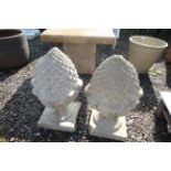 A pair of concrete pineapple style finials, approx