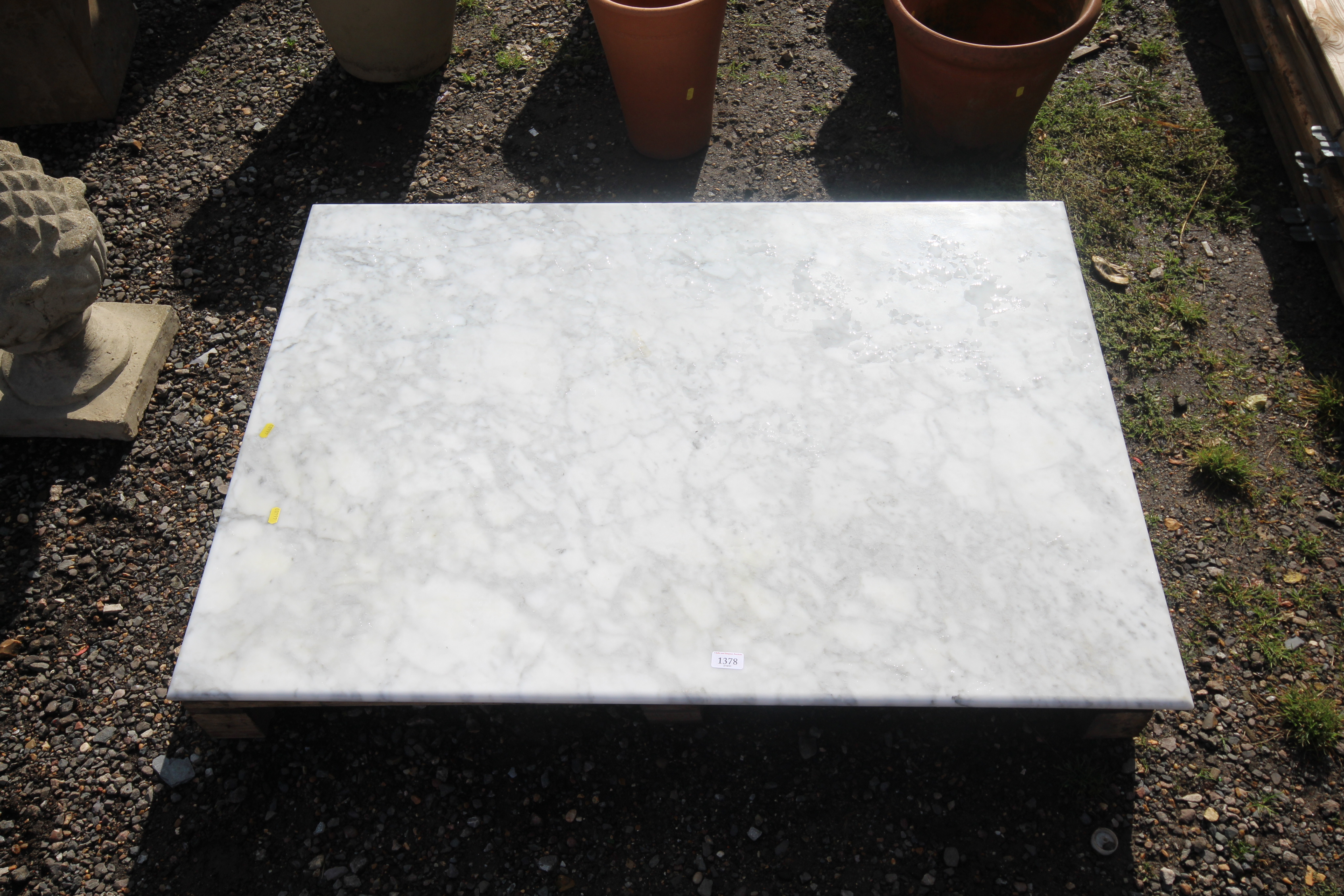 A marble table top measuring approx. 48" x 34"