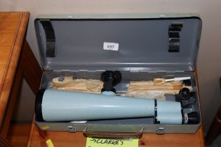 A PZO 40x64 spotting scope in case