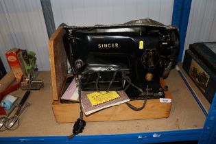 A Singer sewing machine 201k sold as collectors it