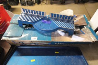 A Nupower 5500MM mitre saw in original box and ins