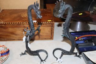 A pair of bronzed dragons