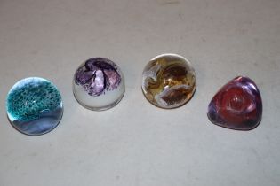 Four Caithness glass paperweights