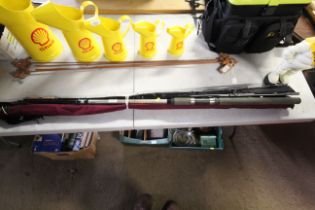 A bundle of three various fishing rods