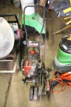 A Sears Craftsman Commercial Duty edger/trimmer wi